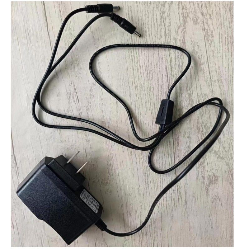 Ημερικανικός τυπικός φορτιστής 8.4V 1.2A με δύο κεφαλές συνεχούς ρεύματος για θερμαινόμενη μπαταρία γάντι